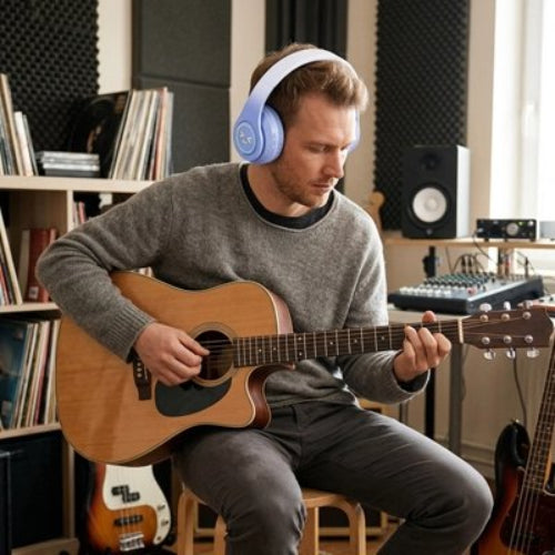 casque audio sans fil bluetooth homme joue guitare