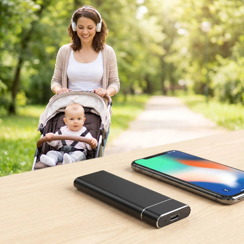disque dur externe usb 3.1 ultra-rapide 4to maman avec bebe en poussette ecoute musique