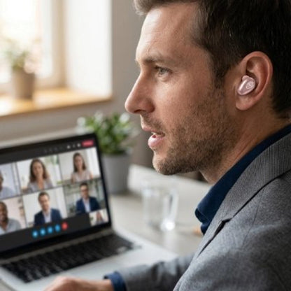 ecouteur bluetooth immersive hd homme devant portable